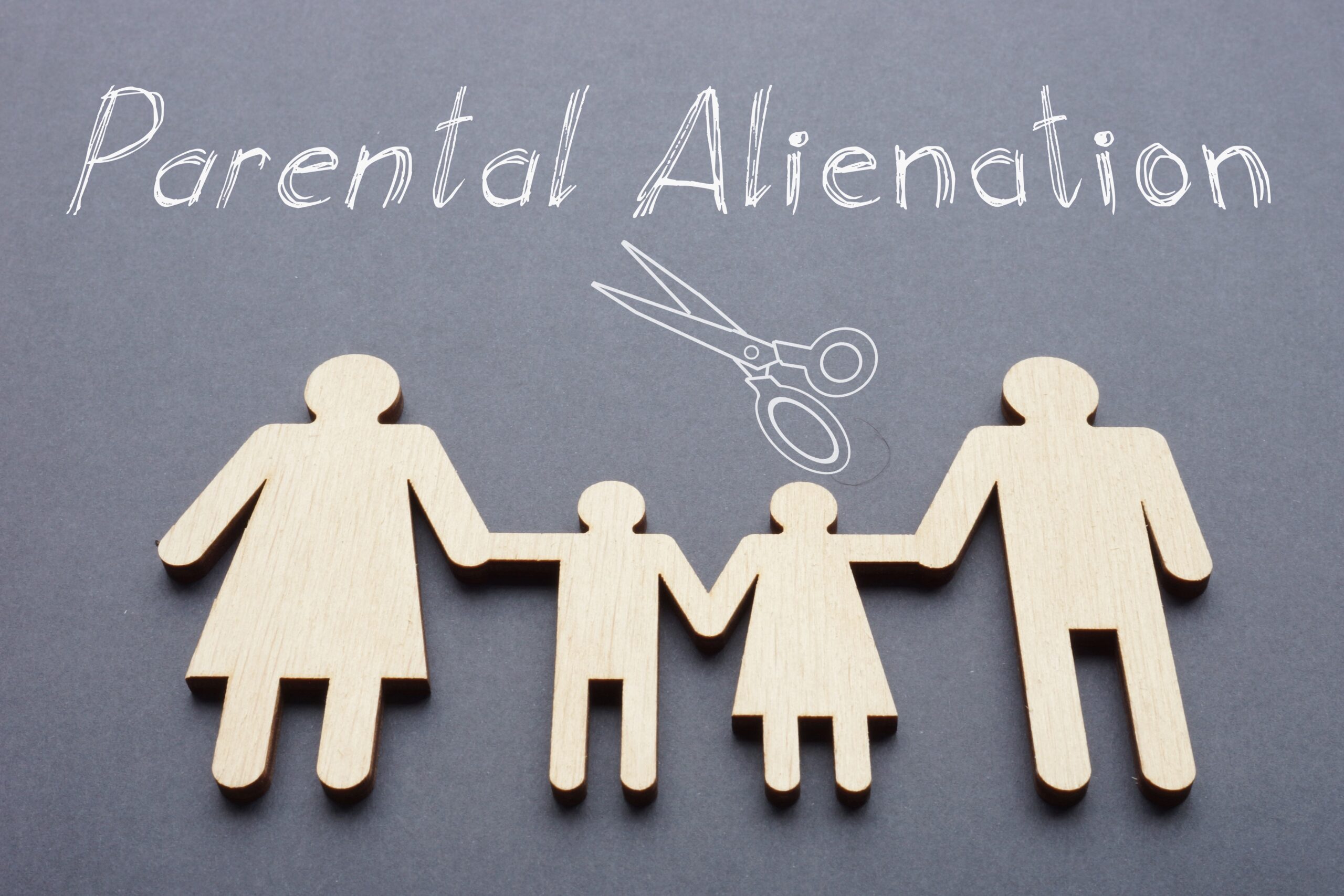Cutouts of a nuclear family holding hands. Parental